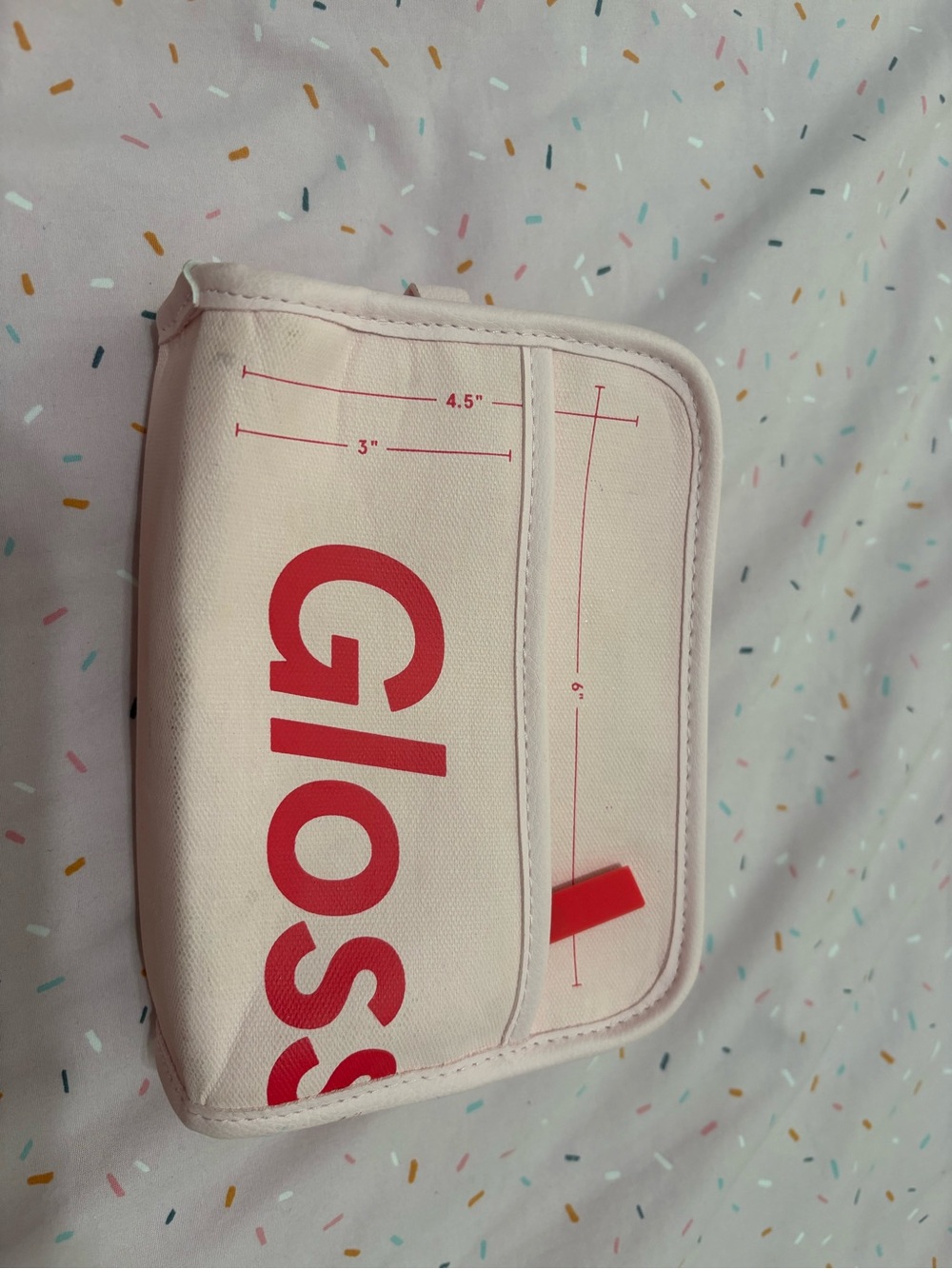 Glossier Pink and Red Mini Makeup Bag